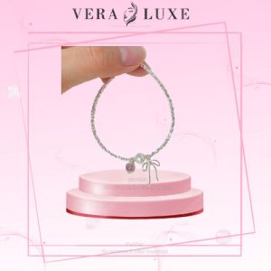 Lắc tay chuỗi hạt charm tim đá hồng nơ xinh ngọc trai